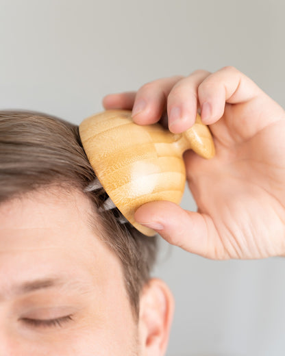 Brosse de massage pour le cuir chevelu et la nuque