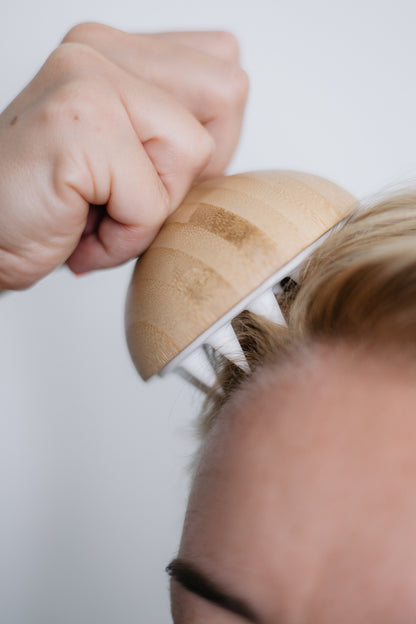 Brosse de massage pour le cuir chevelu et la nuque